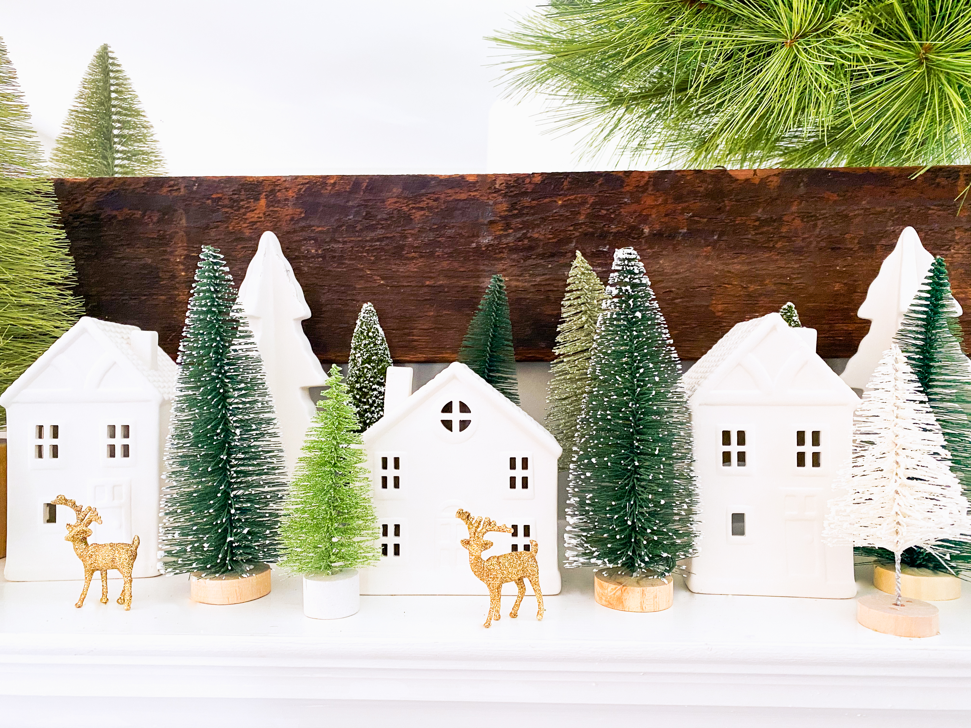 Christmas mantel with bottle brush trees
