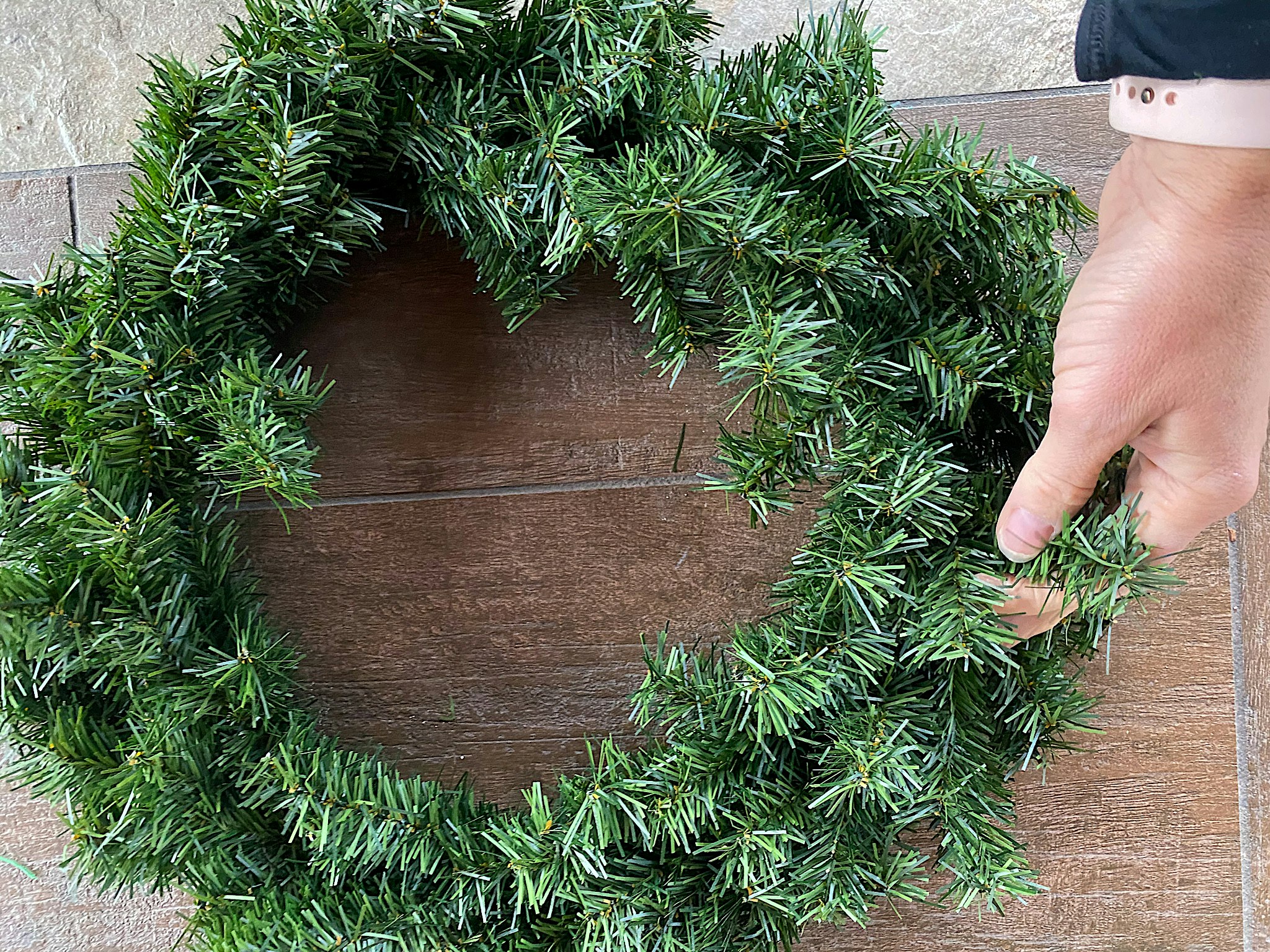 decorating a faux christmas wreath