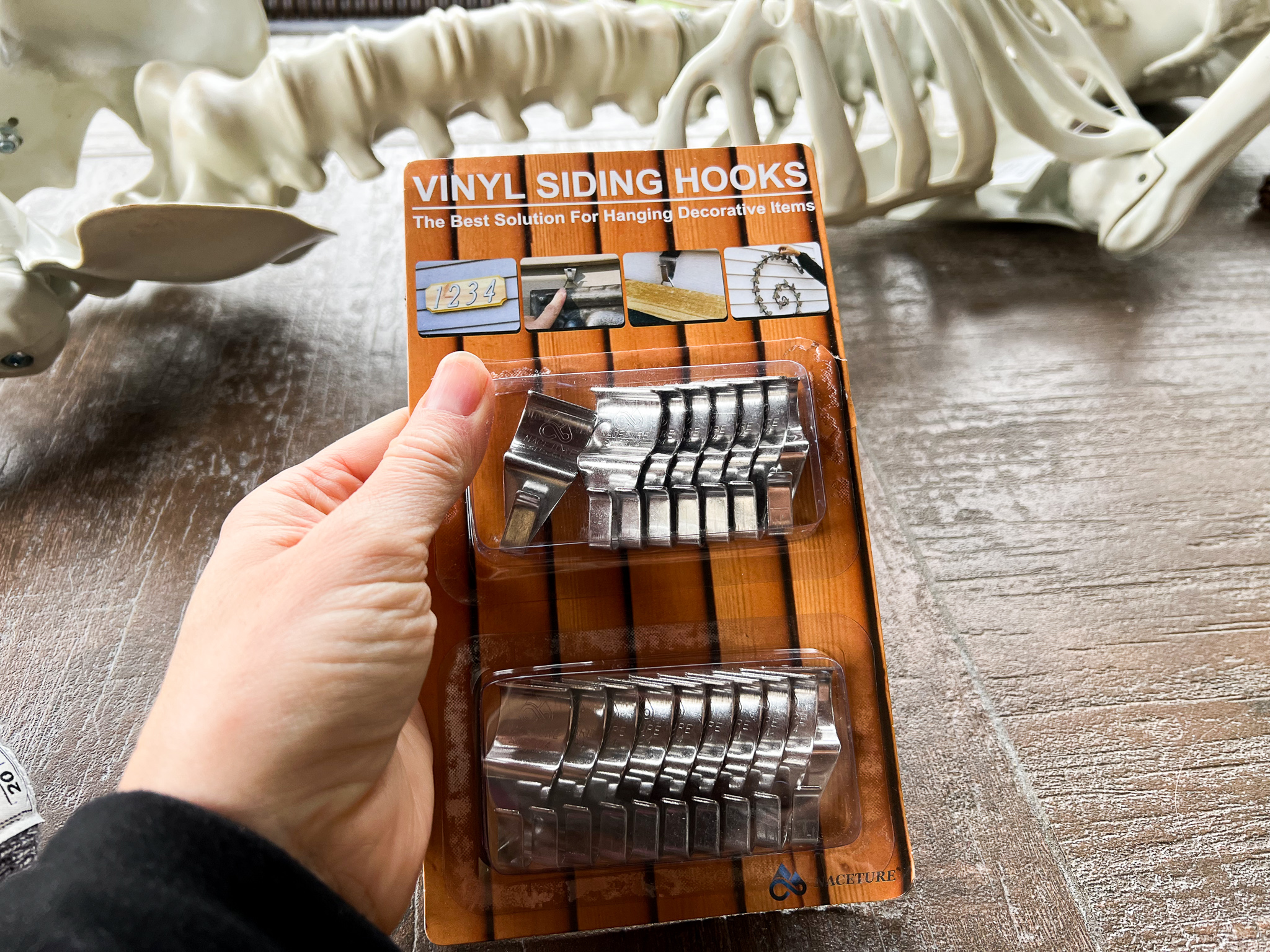 how to hang skeletons on side of house